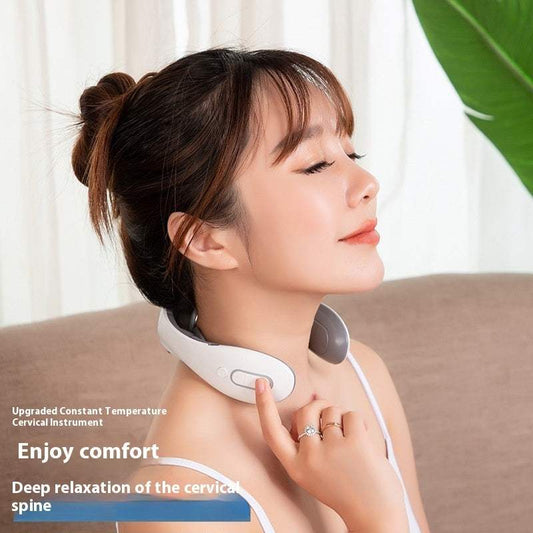 A person using a white neck and shoulder massager around their neck, with the device displaying a 'Enjoy comfort' tagline.