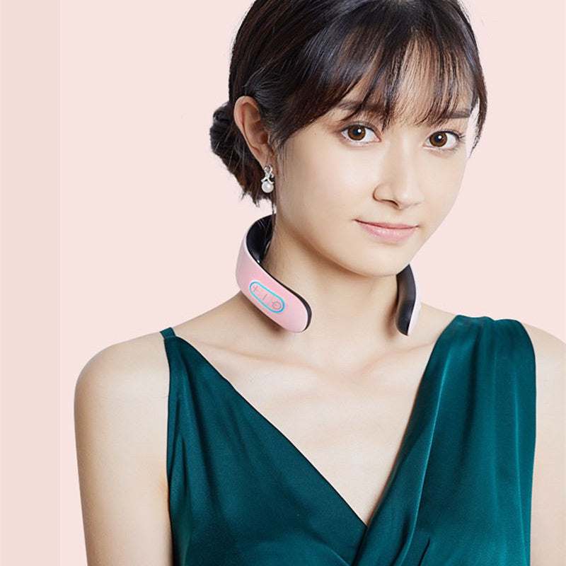 Woman wearing a pink electric pulse cervical massager on neck for shoulder protection and hot compress therapy